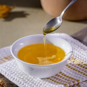 Ghee enthält keinen Milchzucker Flüssige geklärte Butter, Ghee